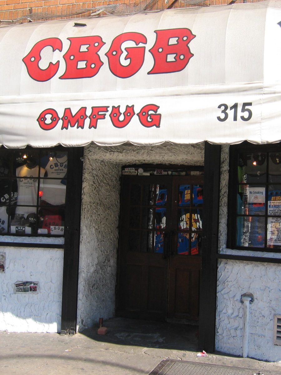 The white CBGB OMFUG awning with red lettering and the number 315 over the club's doorway and T-shirt-filled windows on the Bowery