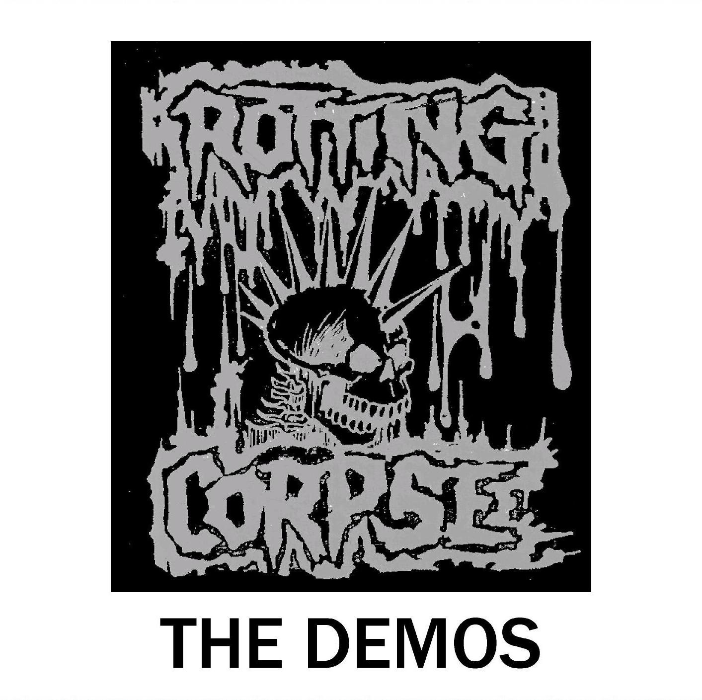 Cover of The Demos: the dripping Rotting Corpse logo in grey around a spiked-hair skull on a black panel, above the words The Demos