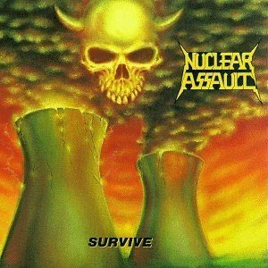 Album cover of Nuclear Assault's Survive: a horned yellow skull rising in a cloud of smoke above two cracked nuclear cooling towers against an orange sky