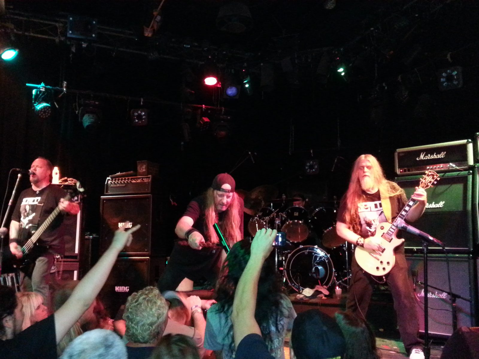 Wizards of Gore, the surviving members of Rigor Mortis, on a club stage in September 2014 with a crowd in front