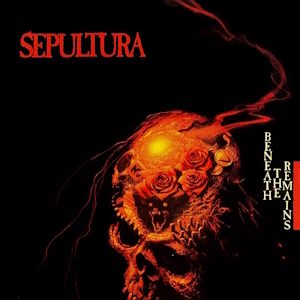 Beneath the Remains cover: a glowing orange-red skull with red roses for eyes on a black background, the red Sepultura logo at top left and the album title running down the right side
