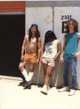 Outside the Arlington practice space off Arkansas Lane, 1987 — the unit the band rehearsed in with the door shut.